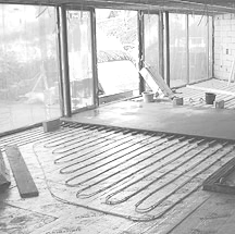 Underfloor heating using a ground source heat pump